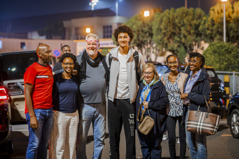 Nate Ament with his family in Rwanda in August.