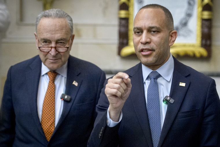 Hakeem Jeffries and Chuck Schumer.