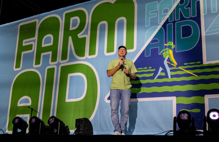 Tim Walz speaks on stage