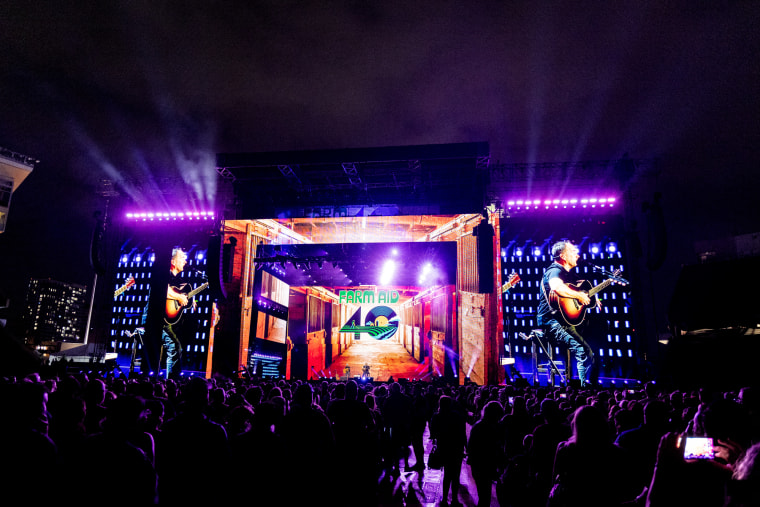 John Mellencamp performs on stage