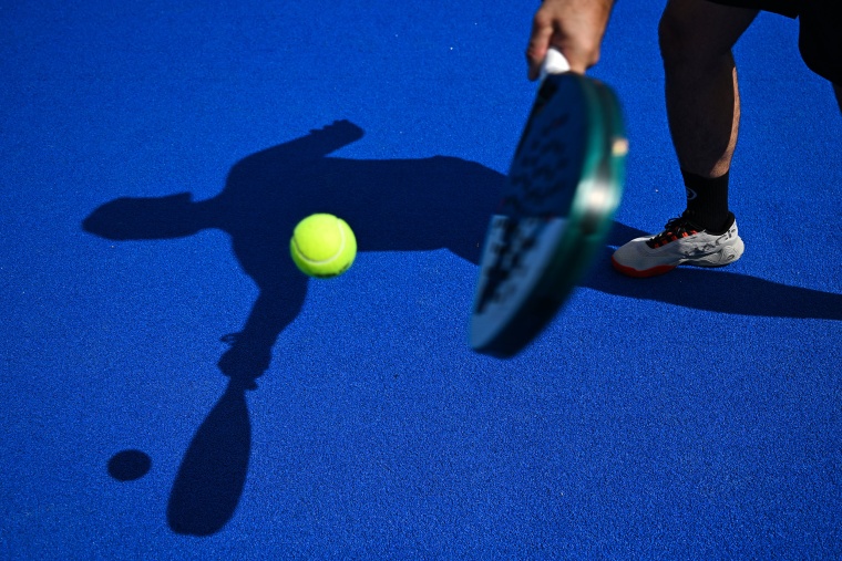 The padel, a mixture of tennis and squash, is played in teams of two on a court that is typically surrounded by glass walls which players can bounce balls off.