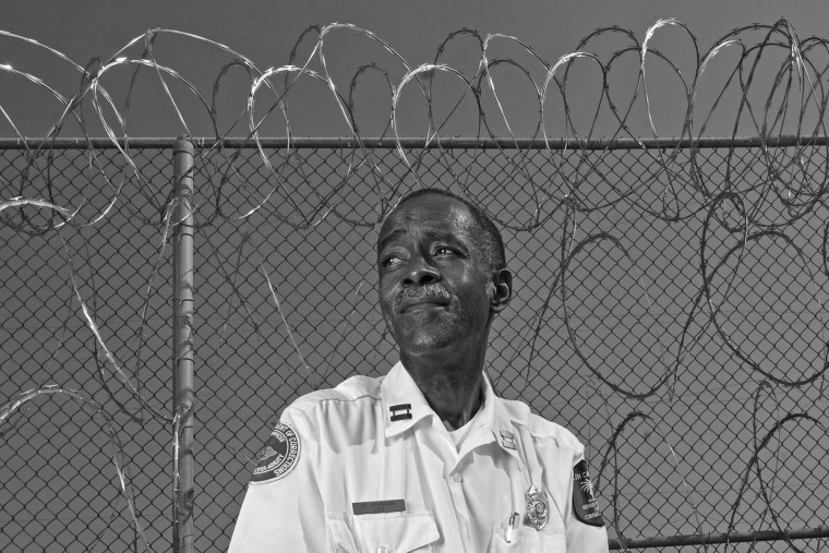 Robert Johnson at the outer fence of the Lee Correctional Institution, in Bishopville, S.C., in 2010.