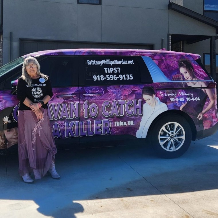 Maggie Zingman standing with her "Caravan to Catch a Killer"