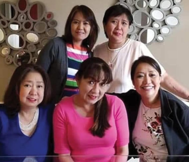 Paula Del Mundo with her sisters