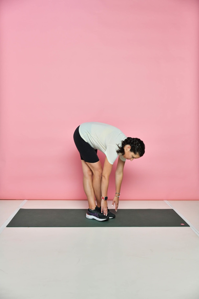 Standing Hamstring Stretch Cross Feet.