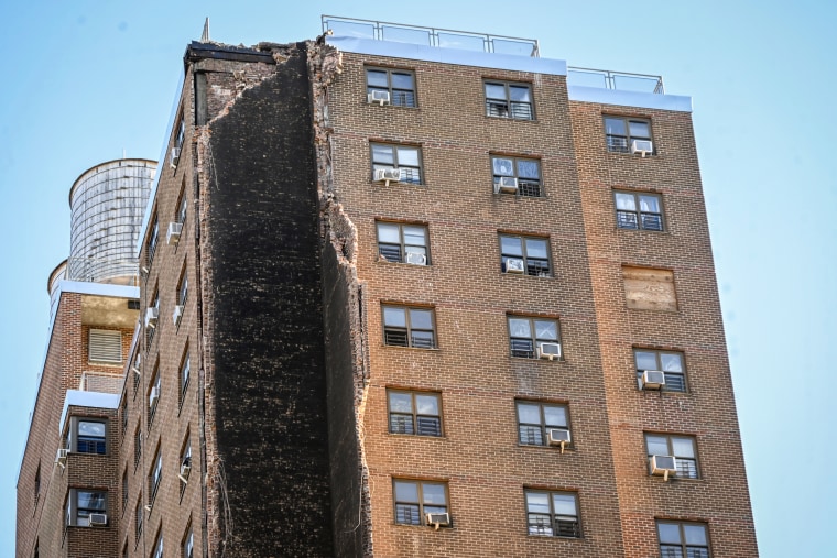 Apartment building in New York partly collapses.