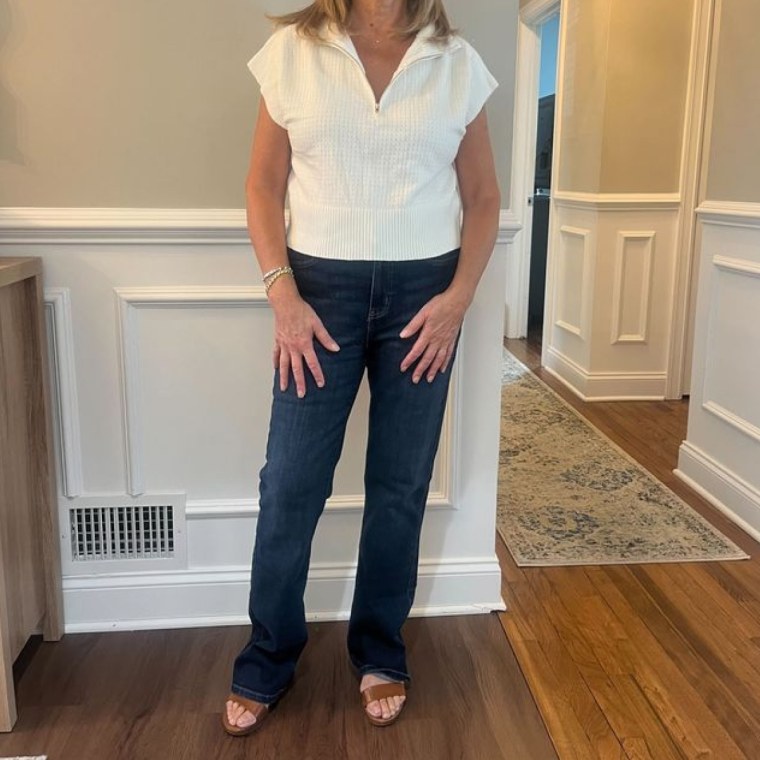 Christina Murphy (mother of commerce writer Danielle Murphy) wearing the Amazon Essentials Mid-Rise Bootcut Jean.