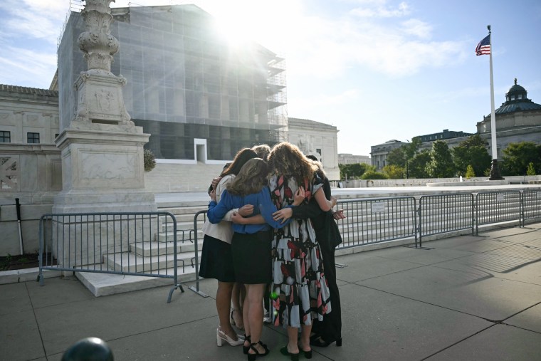 Members of the group "Concerned Women for America" pray outside the Supreme Court as the Court hears oral arguments in Chiles v. Salazar, a landmark case on "conversion therapy," on Oct. 7, 2025.