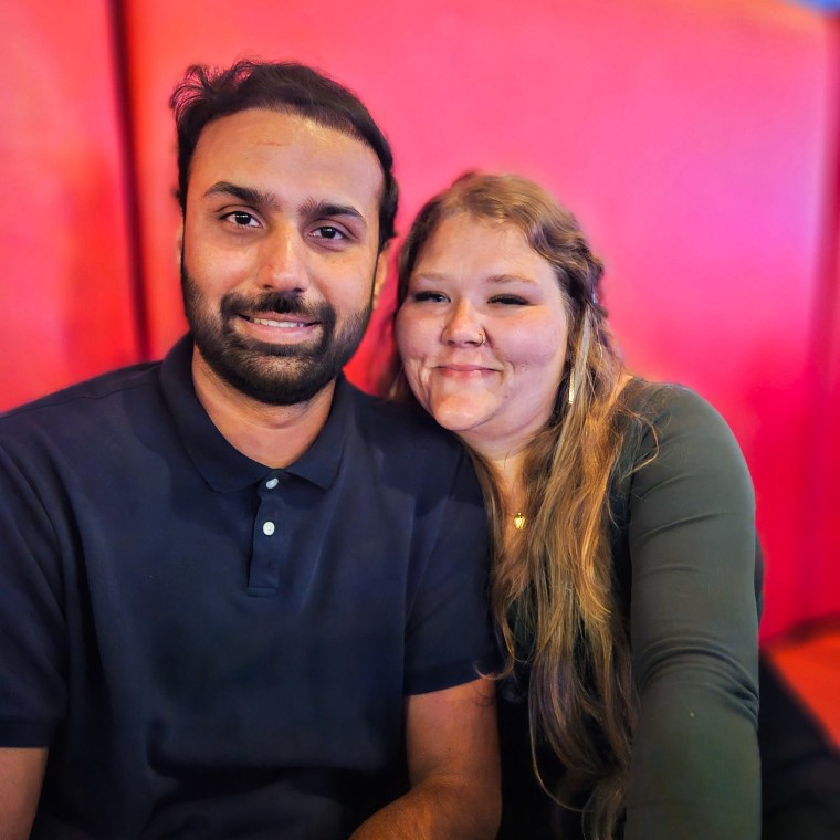 Kapil Raghu and his wife Ashley Mays.