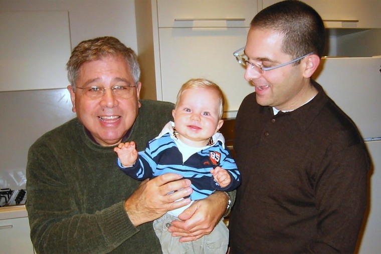 Richard Lakin, his grandchild, and his son, Micah Avni.