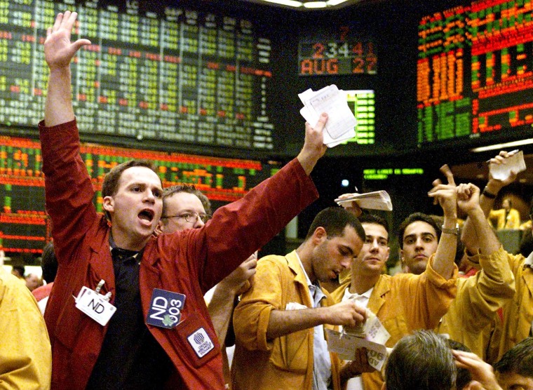 A trader yells out orders during a volatile day of trading on Aug. 27, 1998, at the Chicago Mercantile Exchange.