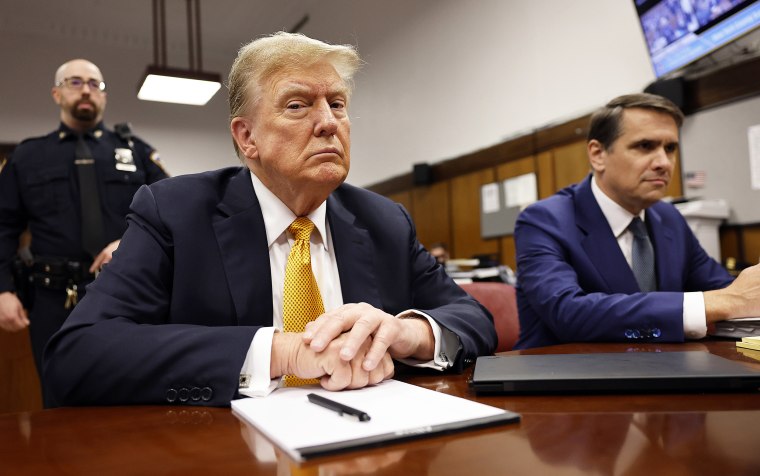 Donald Trump and Todd Blanche.