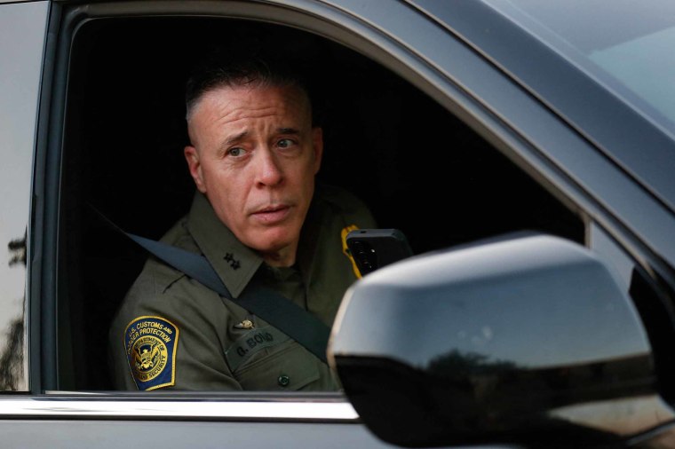 Greg Bovino, US Border Patrol's commander-at-large, looks on during a protest outside the Immigration and Customs Enforcement facility in Broadview, Ill. on October 3.