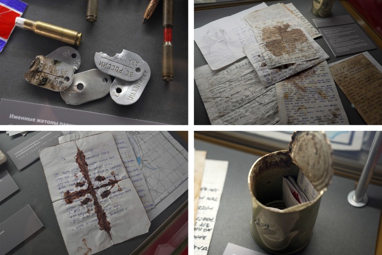 Dog tags and bullets, blood stained letters and a tin containing notes and poems by North Korean soldiers.