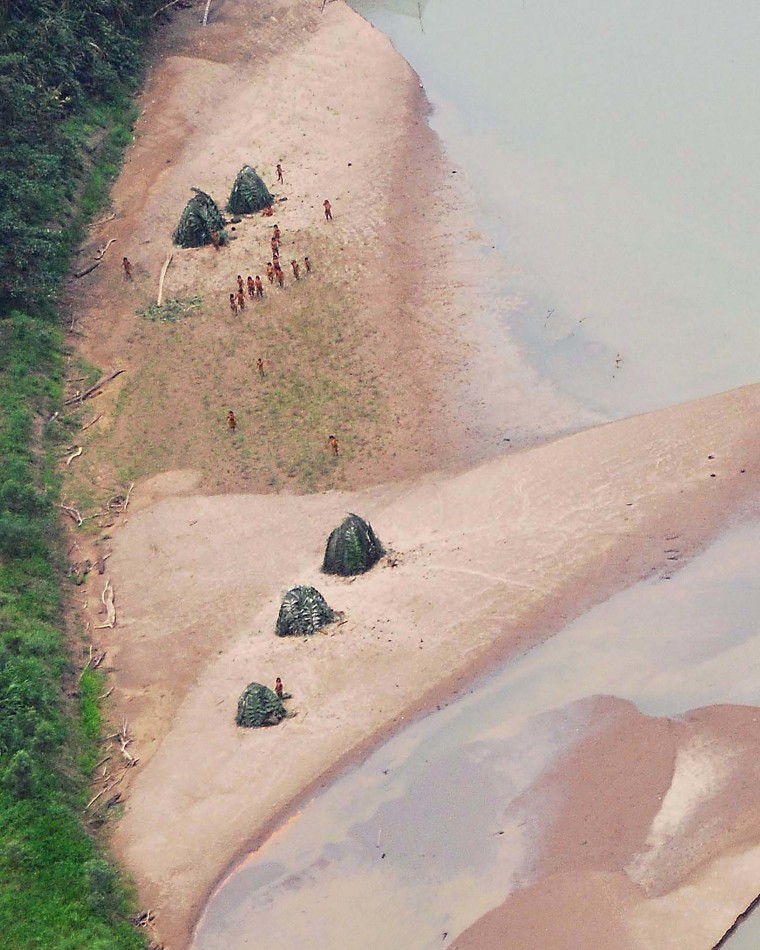Mashco Piro people on the banks of Las Piedras River, Peru in 2007.