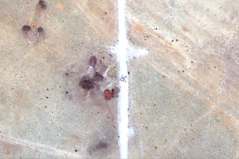 Objects and ground discoloration near el-Fasher on Monday.