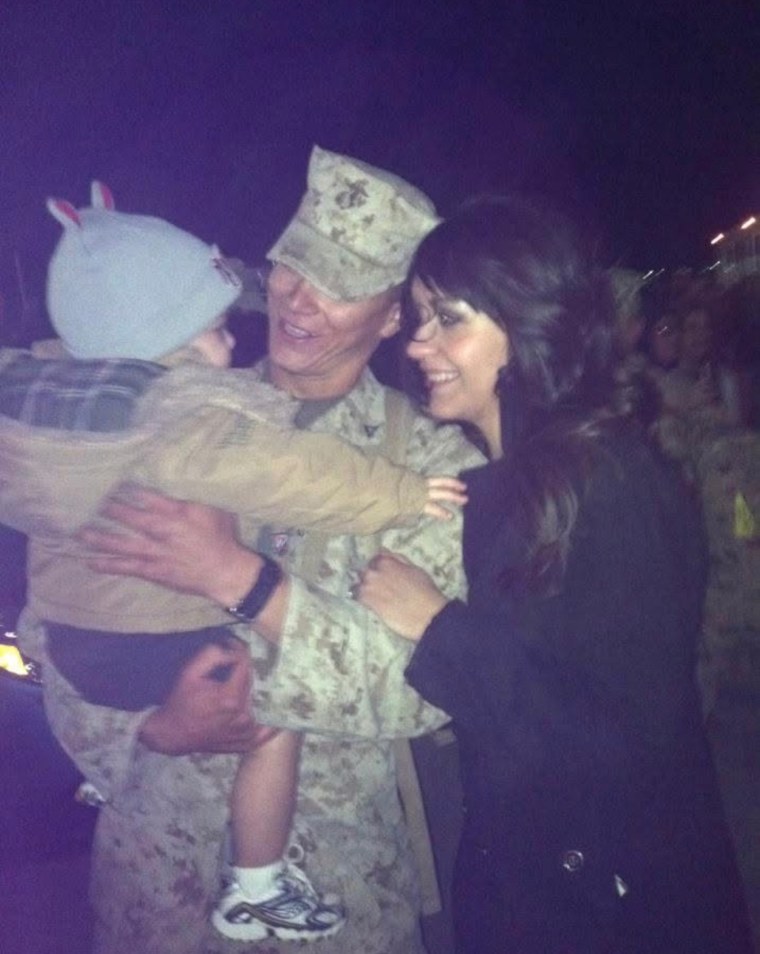 Deano Valdez with his wife and son