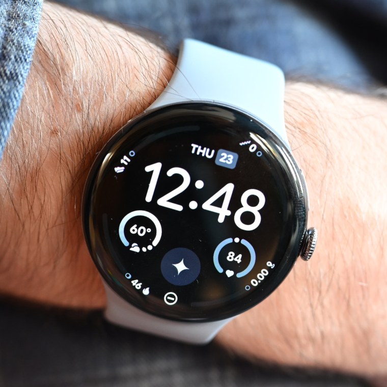 A close up of the Google Pixel Watch 4 on the wrist of the writer.