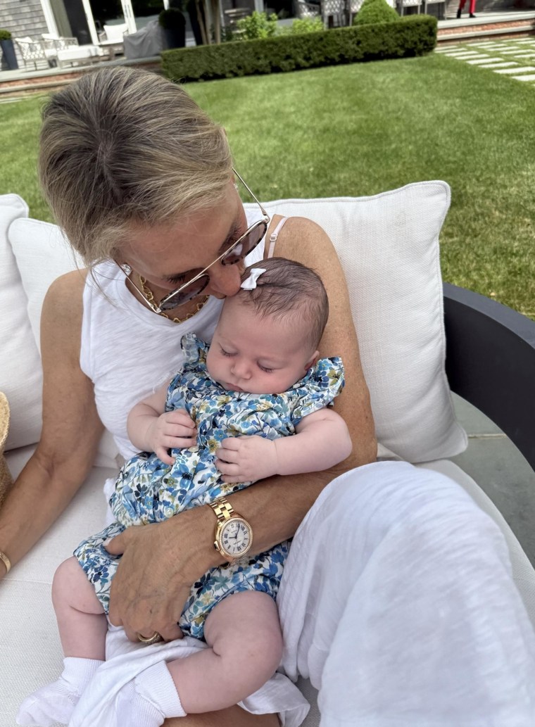 Amanda Warsavsky kept the birth of her third daughter via surrogacy a secret until she was born.