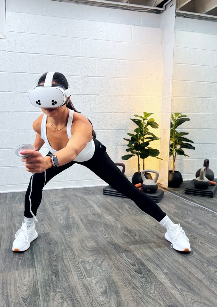 Burke tests out her classes on the FitXR headset so that she can write voiceover scripts for the workout.