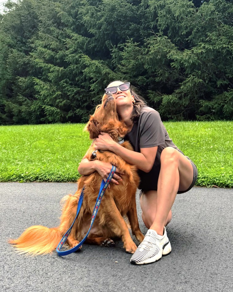 When she can, Burke squeezes in a walk with her dog Nala. 