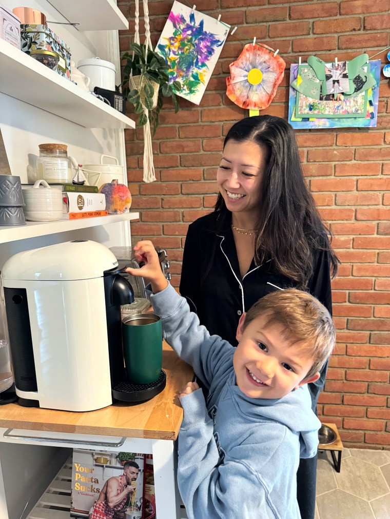 After a glass of water, Burke reaches for a coffee to help power through her morning routine of getting her boys to school.