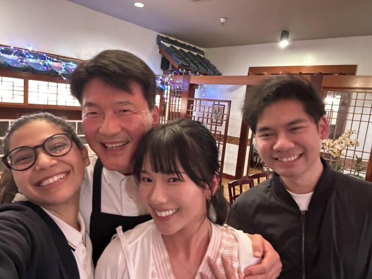 From left: Ernika, Timothy, a friendly waiter at a Korean restaurant, Mako and Sean.