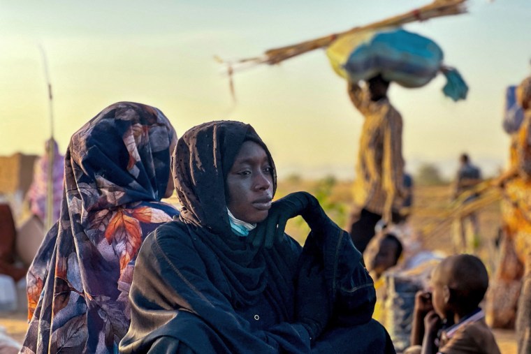 A displaced woman rests in Tawila, in the country's war-torn western Darfur region, on Oct. 28, 2025, after fleeing El-Fasher following the city's fall to the Rapid Support Forces (RSF). 