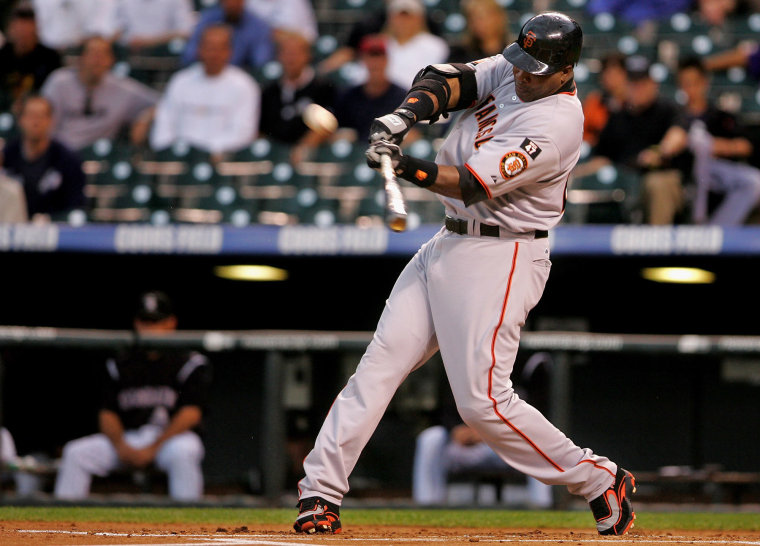 Barry Bonds of the San Francisco Giants hits a home run against the Colorado Rockies in 2007.