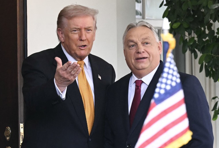 President Donald Trump greets Hungarian Prime Minister Viktor Orban