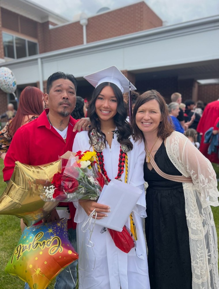 Audra Simmavanh, pictured right, says her husband is a devoted father to his four children, who range in age from 6 to 27 years old.