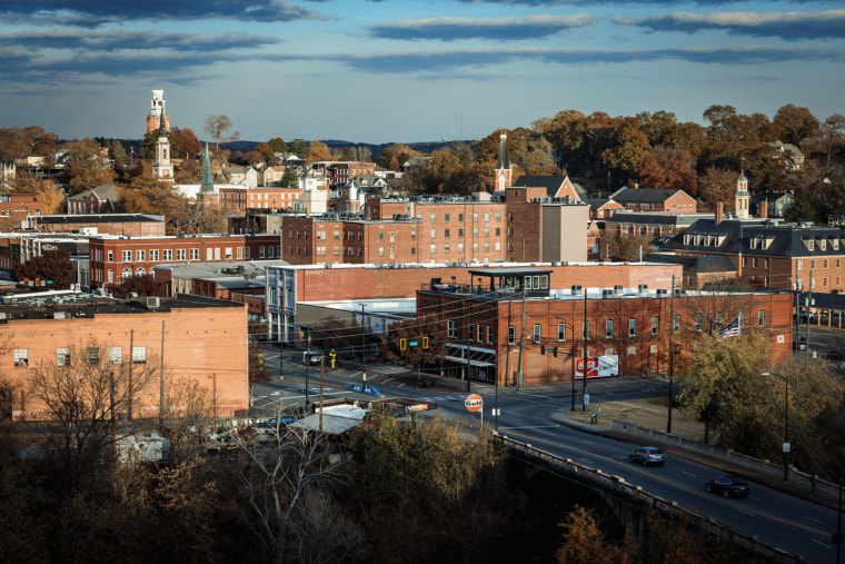 A skyline view of Rome, Ga., building can be seen at sunset.