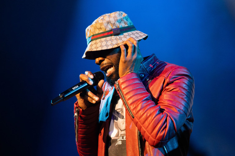 Pras Michel performs with The Fugees in 2023.