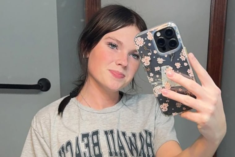 Anna Kepner takes a selfie in a mirror