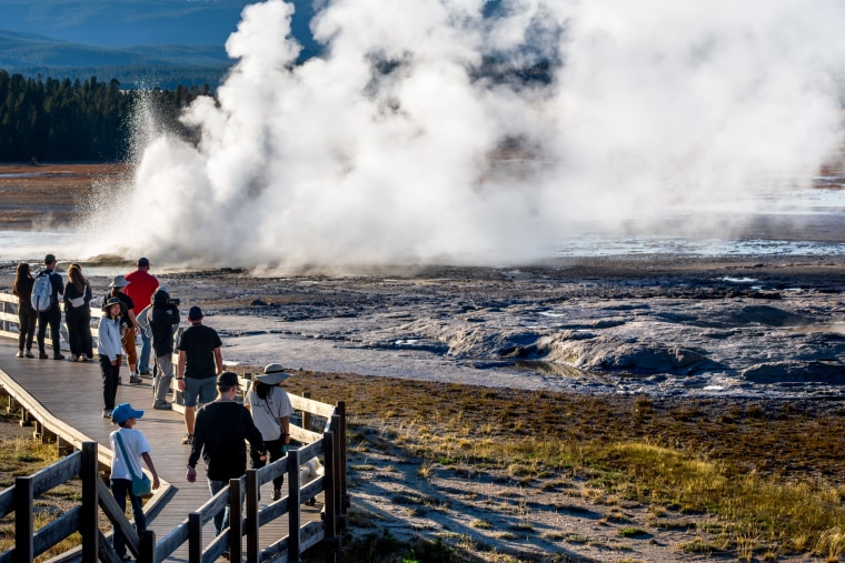 Tourists Visit Yellowstone National Park.