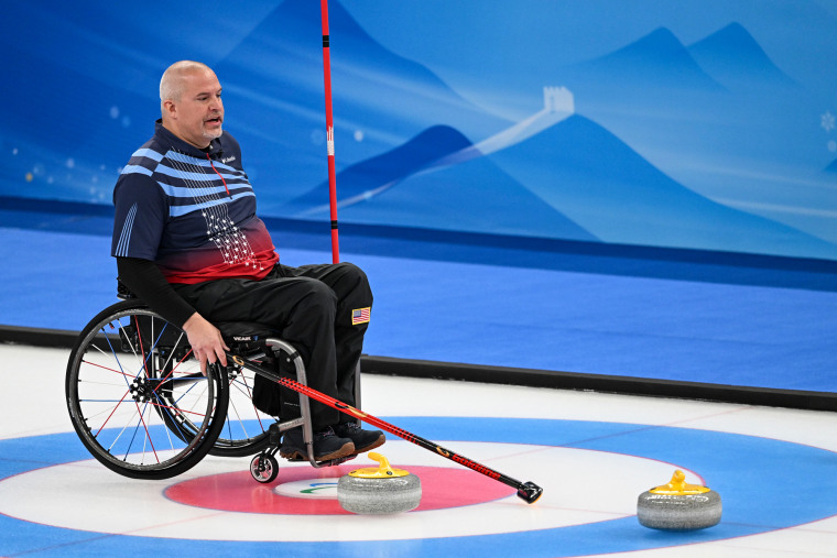 Steve Emt plays curling on ice
