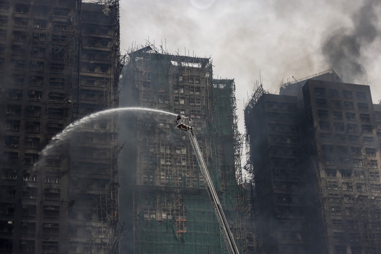 Image: Hong Kong Apartment Fire Kills At Least 44 With Hundreds Missing