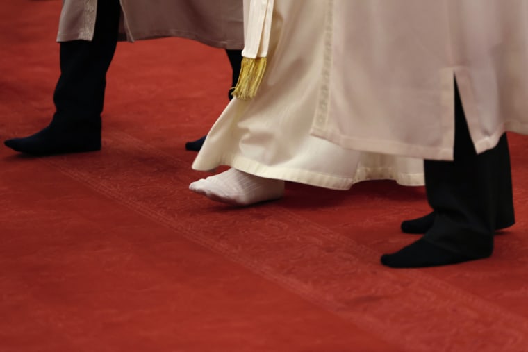 Pope Leo XIV walks without shoes as he visits the Sultan Ahmed Mosque on Nov. 29