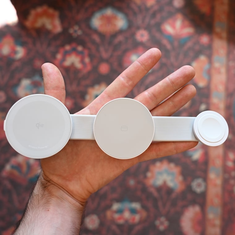 A close up video of someone folding the Anker MagGo 3-in-1 Folding Wireless Charger Station.