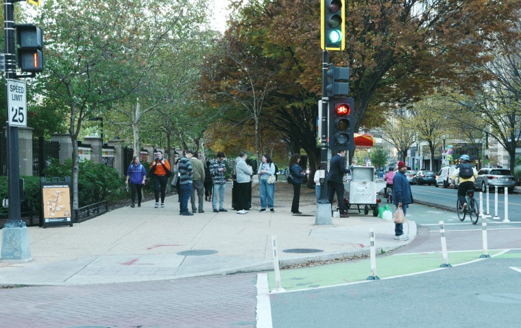 Customers wait in line for Shysters Dogs.