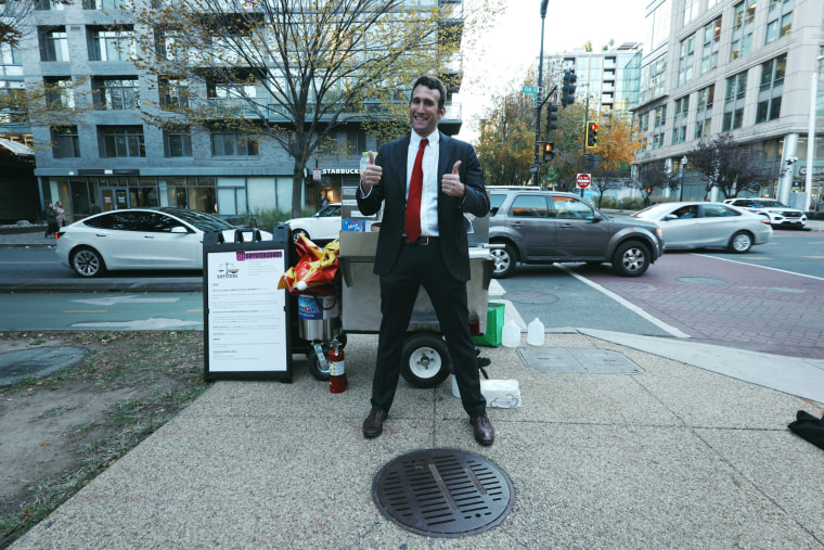 Isaac Stein with his hot dog cart.