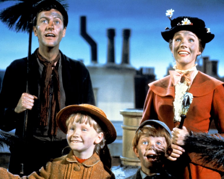 Dick Van Dyke as Bert, Julie Andrews as Mary Poppins, Karen Dotrice as Jane Banks and Matthew Garber (1956 - 1977) as Michael Banks in the Disney musical 'Mary Poppins', directed by Robert Stevenson, 1964.