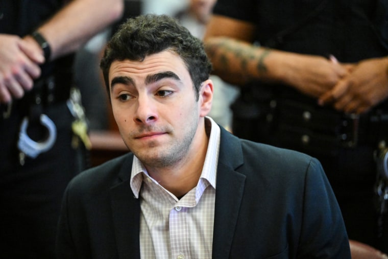 Luigi Mangione sits in court