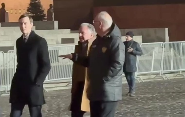 From left, Jared Kushner, presidential envoy Steve Witkoff and Kirill Dmitriev, one of Russia's key negotiatiors, walk through Red Square before a scheduled meeting with Russian President Vladimir Putin in Moscow on Dec. 2, 2025.