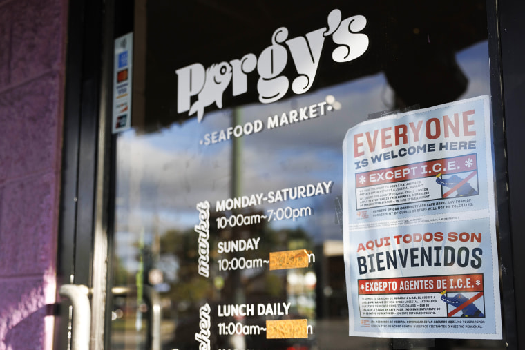 "Everyone is welcome here except I.C.E." sign displayed on the outside of New Orleans businesses.