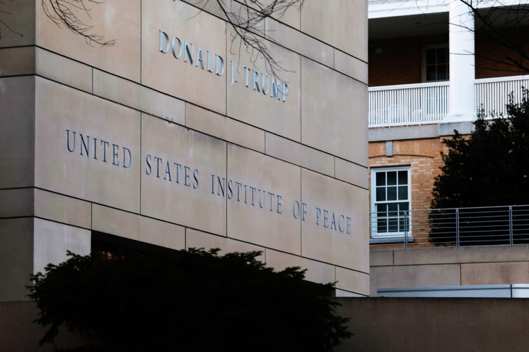 President Donald Trump's name is seen recently placed on the outside of the U.S. Institute of Peace headquarters on Dec. 3, 2025 in Washington, D.C.