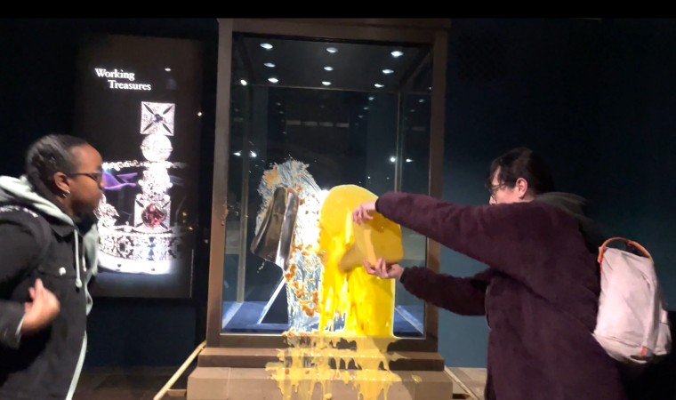 A video appears to show substances being smeared against the glass display case containing the State Crown at the Tower of London on Dec. 6.