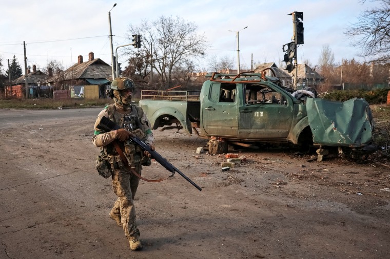 Ukrainian serviceman walks on a street in the frontline town of Kostiantynivka