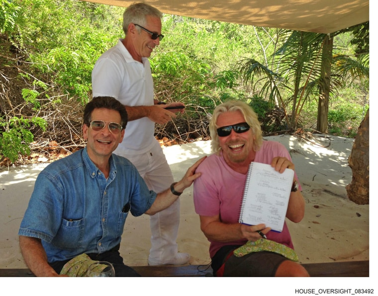 Jeffrey Epstein, Richard Branson and an unidentified man in a photo released by the House Oversight Committee.