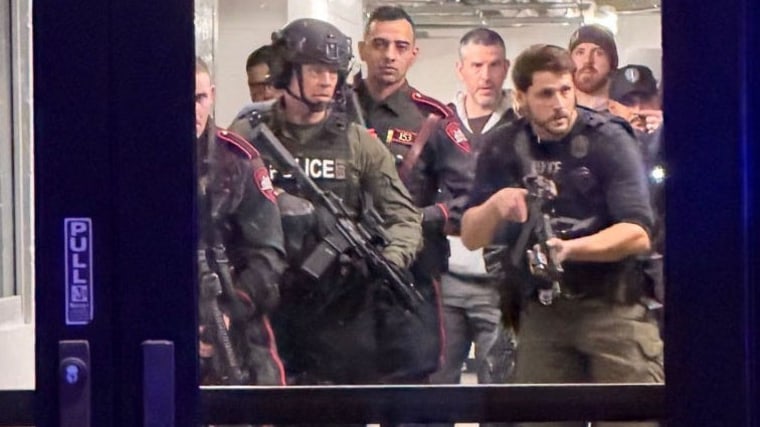 Police at 6:20 p.m. still clearing the building at the center of the Brown University shooting